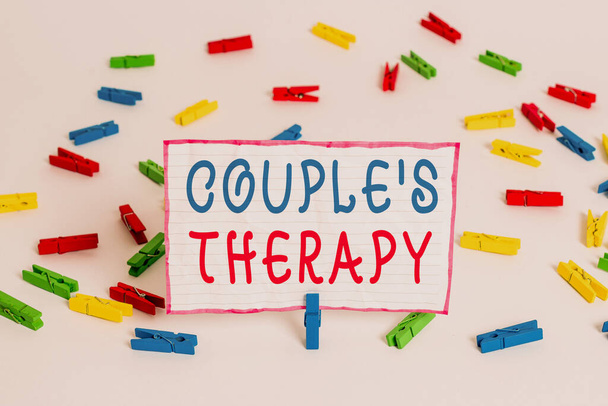 Conceptual hand writing showing Couple S Therapy. Concept meaning treat relationship distress for individuals and couples Colored clothespin papers empty reminder white floor office - Photo, Image