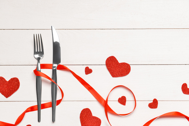 Beautiful table setting for Valentine's Day on white wooden background - 写真・画像