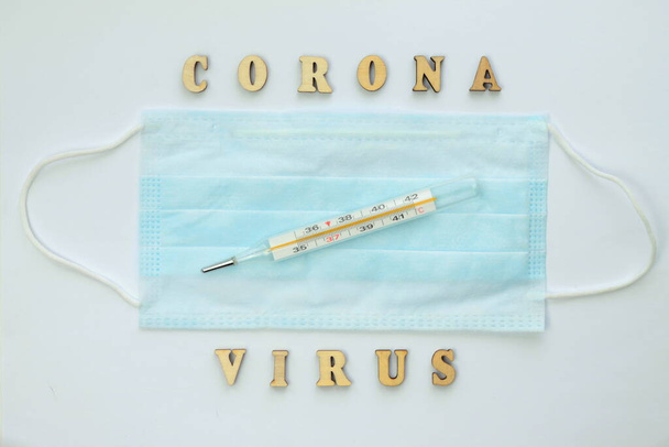 Word coronovirus in wooden letters. Global healthcare concept pandemic virus infection from Wuhan, China. Novel Coronavirus outbreak - Foto, Bild