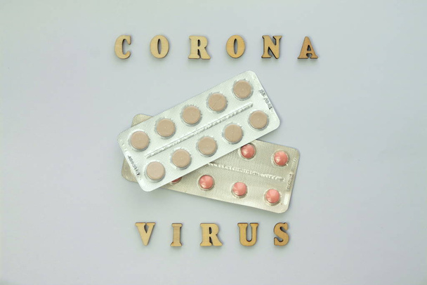 Word coronovirus in wooden letters. Global healthcare concept pandemic virus infection from Wuhan, China. Novel Coronavirus outbreak - Φωτογραφία, εικόνα