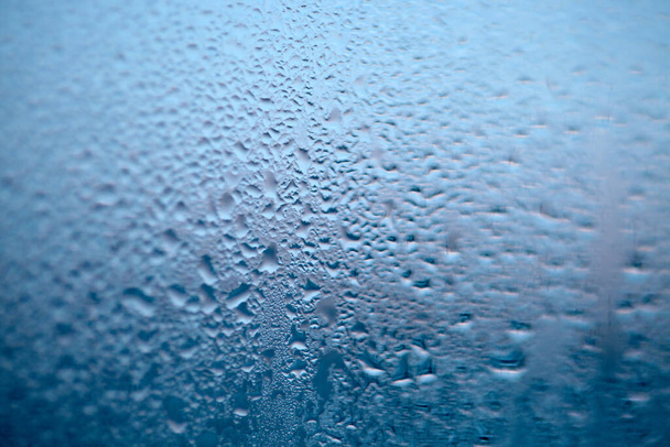 Druppels gecondenseerde stoom, druppels water. Close-up detail van de hydratatie - Foto, afbeelding