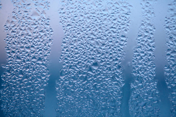 Druppels gecondenseerde stoom, druppels water. Close-up detail van de hydratatie - Foto, afbeelding