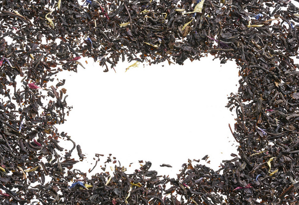 A scattering of elite black tea on a white background - Fotografie, Obrázek