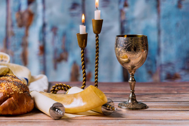 Shabbat eve table challah bread and candelas with kidush wine - Photo, Image