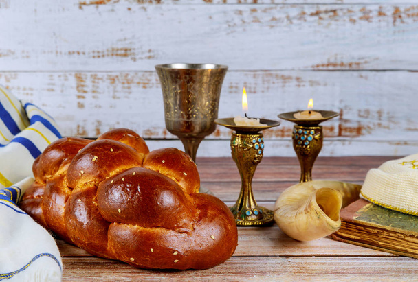 Shabbat shalom traditional Jewish ritual challah bread, wine candles - Photo, Image
