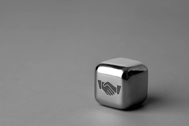 Business & strategy icon on metal cube for futuristic style - Foto, Imagen