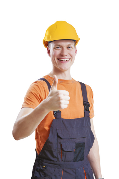 Construction worker giving thumbs up - Фото, зображення