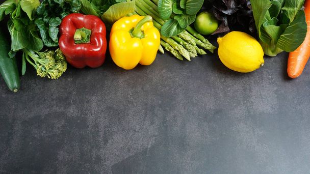 Fresh organic vegetables background on table, Healthy food concept top view. - Fotó, kép