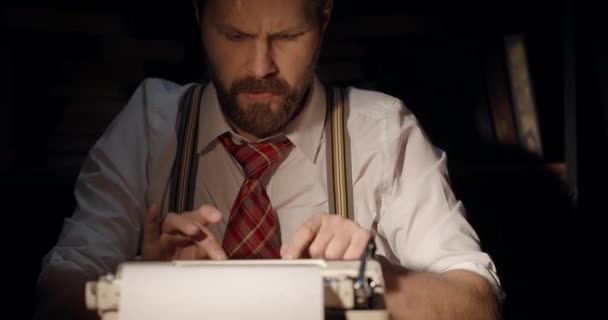 Male Writer Reading Typed Page - Video, Çekim