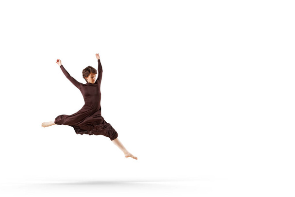 Young dancer performing . Mixed media - Фото, изображение
