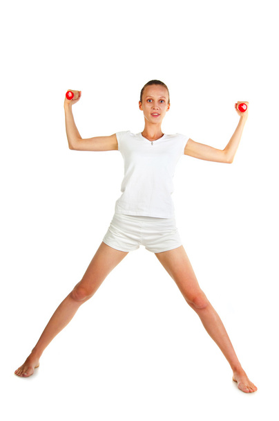 Woman doing dumbbells exercises - Valokuva, kuva