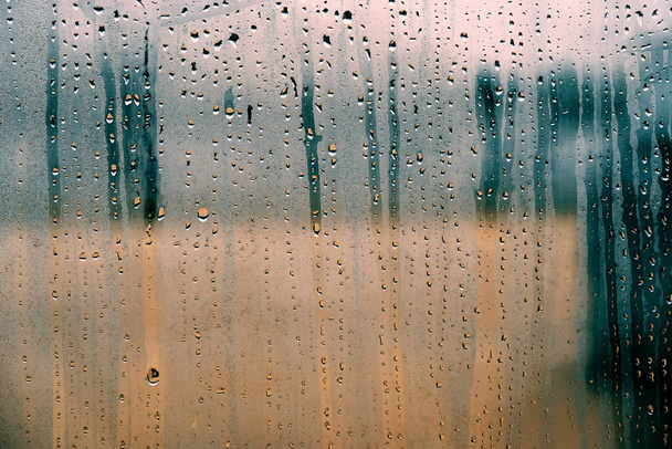 Rainy weather condensation texture on window. - Photo, Image