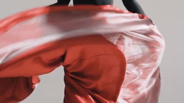 woman posing in a fluttering red skirt red cloth fluttering - Video, Çekim