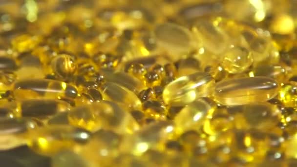 Fish oil capsules are spinning - 映像、動画
