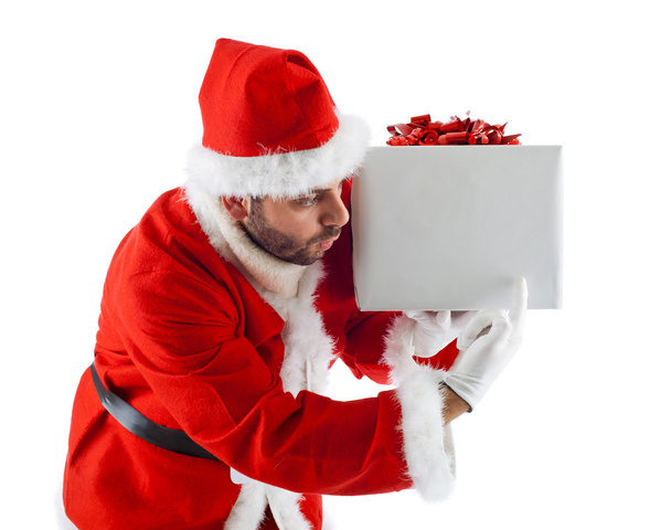 Young Santa Claus with gift box - Фото, зображення