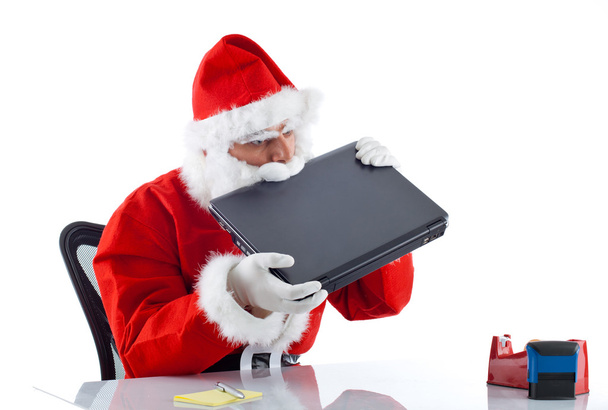 Young Santa Claus with notebook - Foto, Imagen