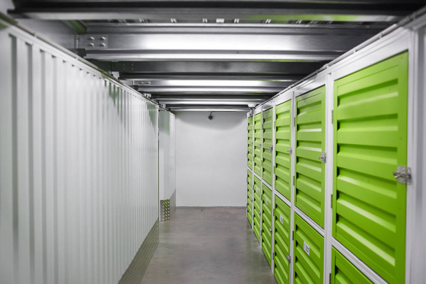 Modern warehouse with green storage rooms - Photo, Image