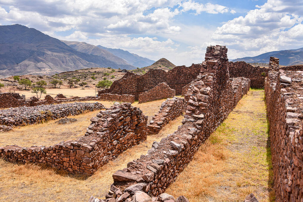 Ancient walls and buildings at the Pikillacta archaeological site. Cusco, Peru  - Photo, Image