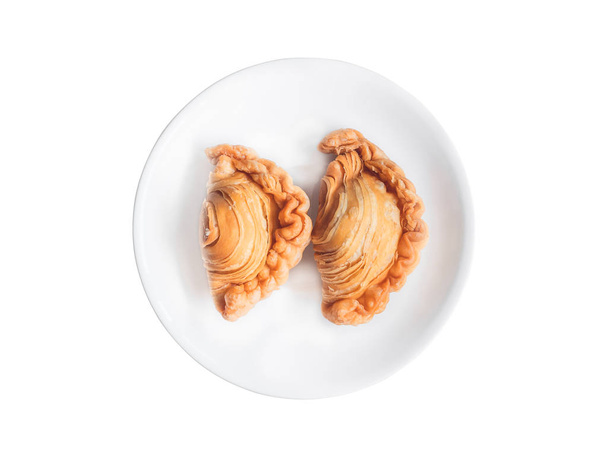 Curry puff on white plate - Foto, Imagen