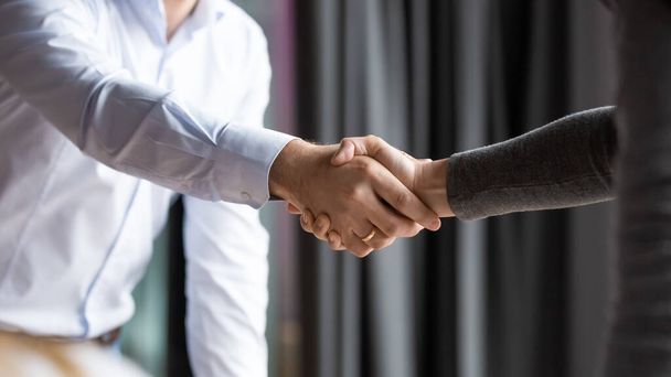 Close up business partners shaking hands, making agreement, acquaintance - Φωτογραφία, εικόνα