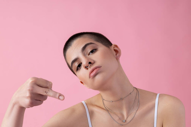 Rude young girl showing middle finger stock photo - Foto, Bild
