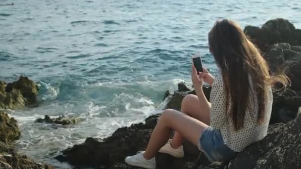 She loves to spend time alone by the sea - Footage, Video
