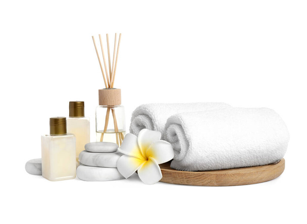Beautiful spa composition with reed diffuser on white background - Fotó, kép