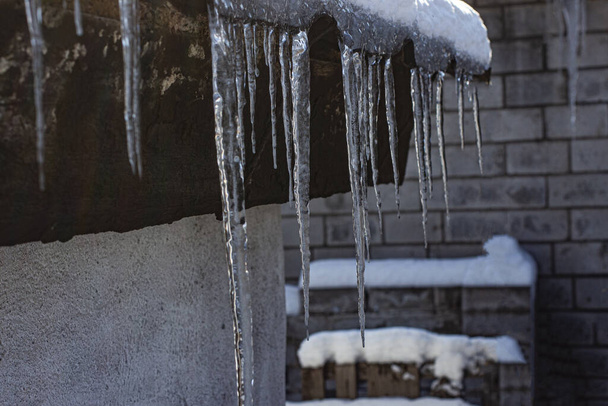Large and dangerous icicles can harm humans and animals. - Photo, Image