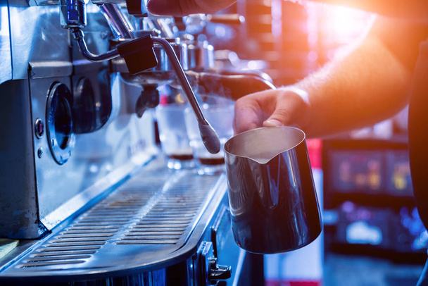 The bartender makes the coffee, cappuccino, cocoa, drink at the bar.  - Foto, immagini