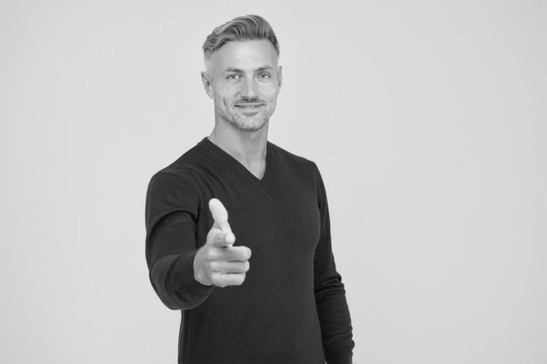 Motivated man. Self confident and motivated. Feeling motivated. You are awesome. Man mature hipster yellow background. Masculinity and brutality. Guy bristle pointing at you. Support and motivation - Foto, afbeelding