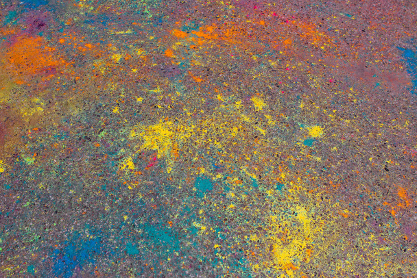 Background of colorful Holi powder on the ground - Foto, Imagen