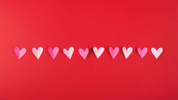 Valentines day background with hearts on red. - Φωτογραφία, εικόνα