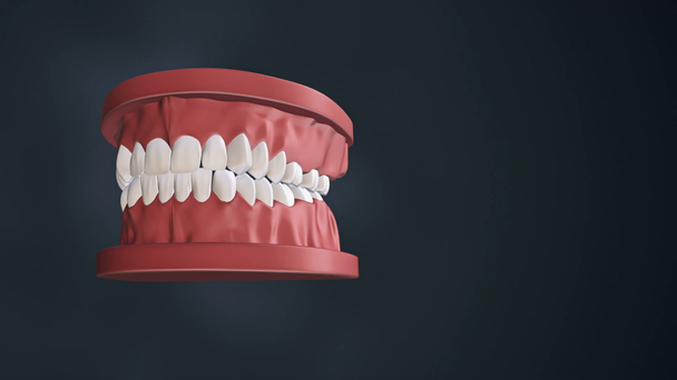 Tło medyczne z animacją otwarcia szczęki ludzkiej zębami i implantami stomatologicznymi. Animacja pętli płynnej - Materiał filmowy, wideo