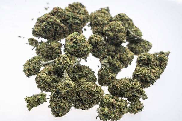 medical marijuana cannabis buds closeup on white studio background - Fotoğraf, Görsel