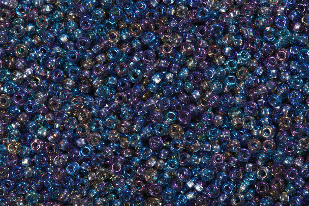 Gros plan de perles de graines bleues multicolores
. - Photo, image