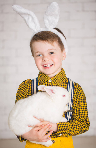 Boy with a rabbit - 写真・画像