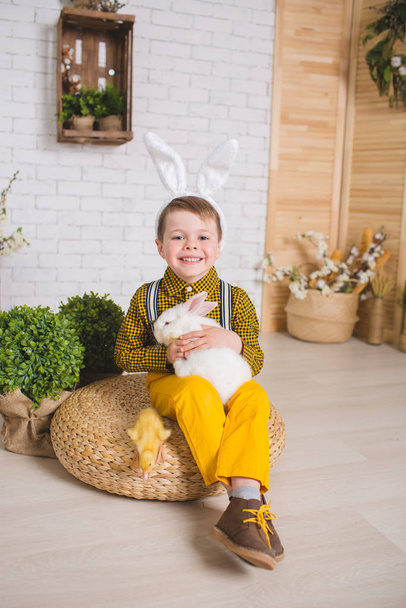 Boy with a rabbit - Φωτογραφία, εικόνα