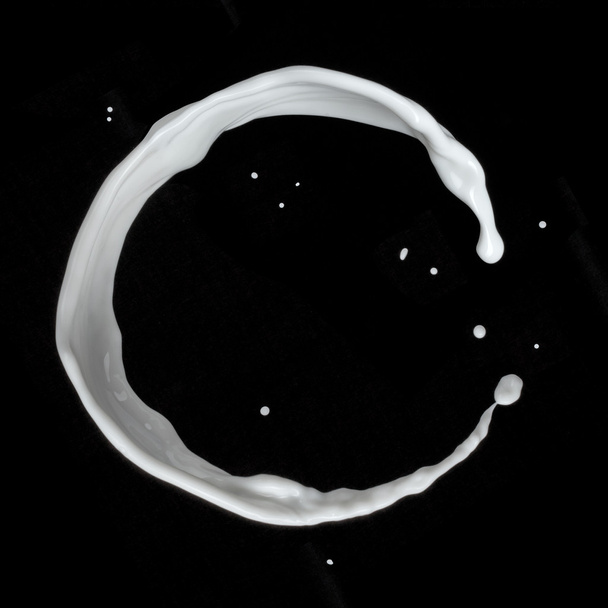 milk splash isolated on black background - Zdjęcie, obraz
