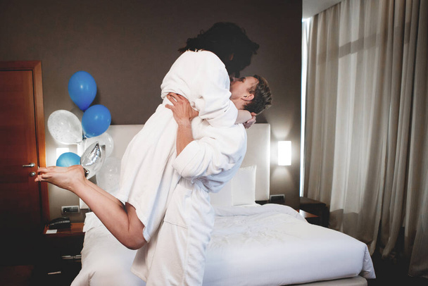 Young Couple in hotel room. - Fotó, kép