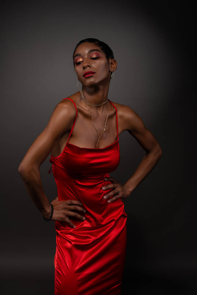 Slim black woman in red - Valokuva, kuva