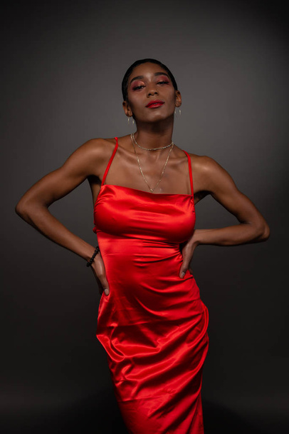 Slim black woman in red - Photo, Image