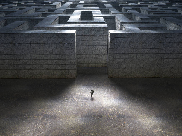 Man standing at the entrance of a huge stone maze. - Zdjęcie, obraz