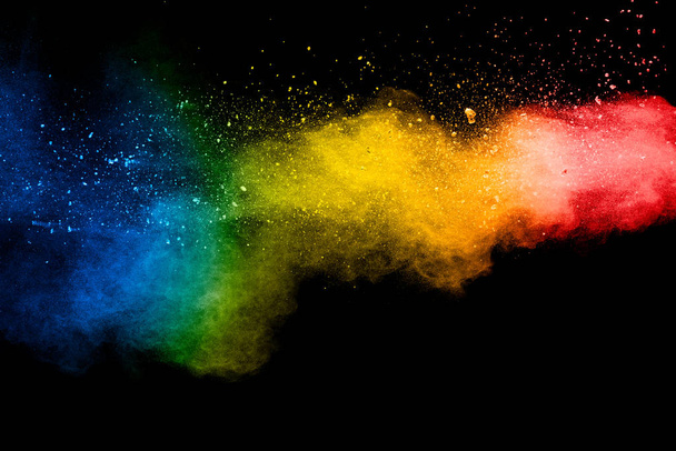 Pastel color dust particle splashing.Colorful powder explosion on white background. - Photo, Image