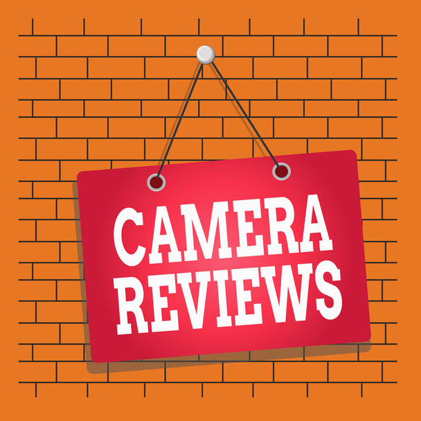 Text sign showing Camera Reviews. Business photo showcasing examine or assess formally with the possibility to change Colored memo reminder empty board blank space attach background rectangle - Photo, Image