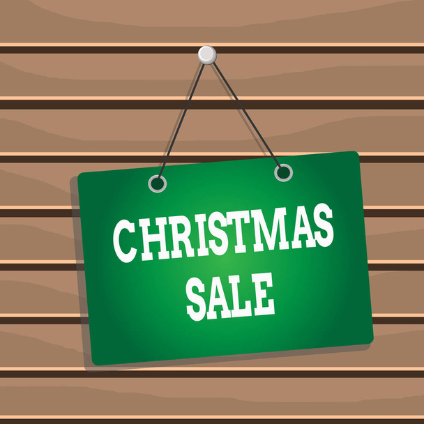 Conceptual hand writing showing Christmas Sale. Concept meaning period during which a retailer sells goods at reduced prices Memo reminder empty board attached background rectangle - Photo, Image