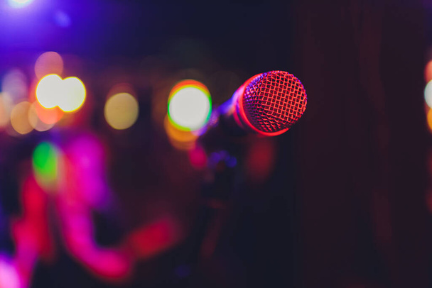 Microphone on stage in club with background. - Φωτογραφία, εικόνα