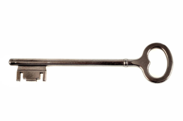 Vanha avain lähikuva valkoisella taustalla
 - Valokuva, kuva