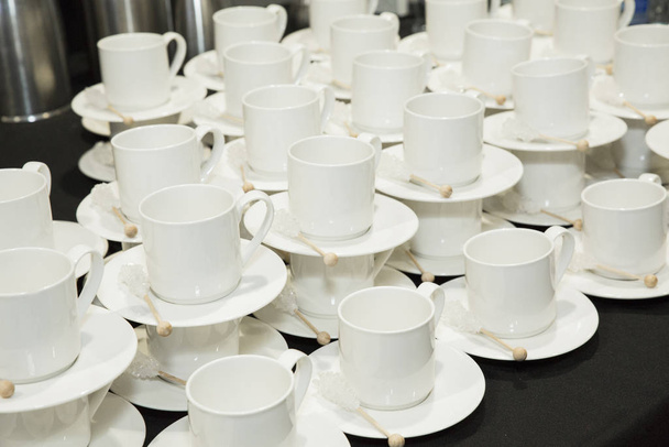 cups and saucers in a conference working capital reunion breakfast catering - Photo, Image