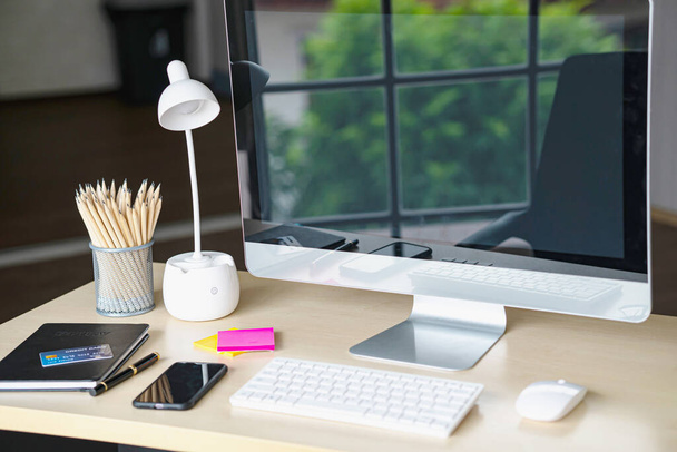 Modern work table with computer. Business finance concepts ideas - 写真・画像