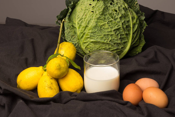Овощной натюрморт с лимонами и яйцами
 - Фото, изображение